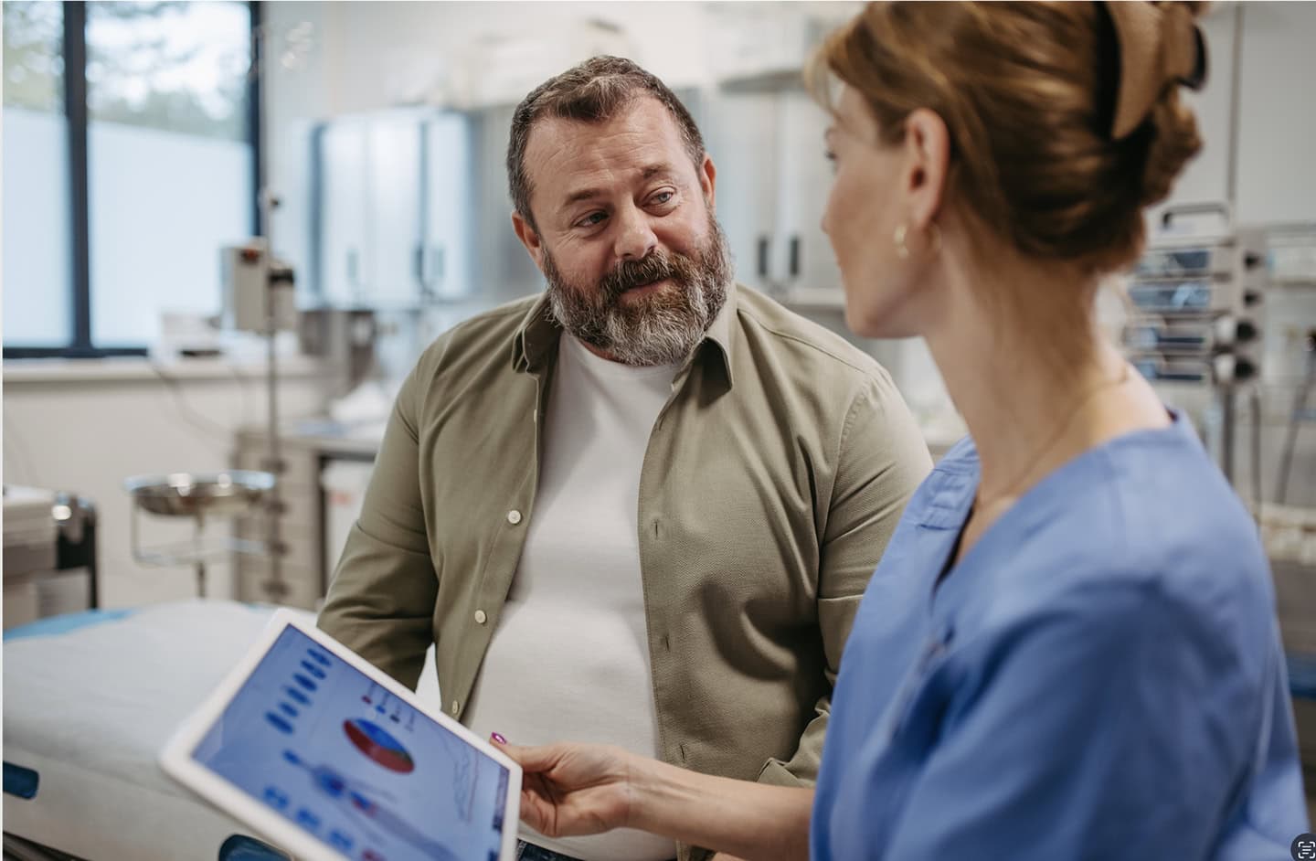 Image A doctor and a patient talking