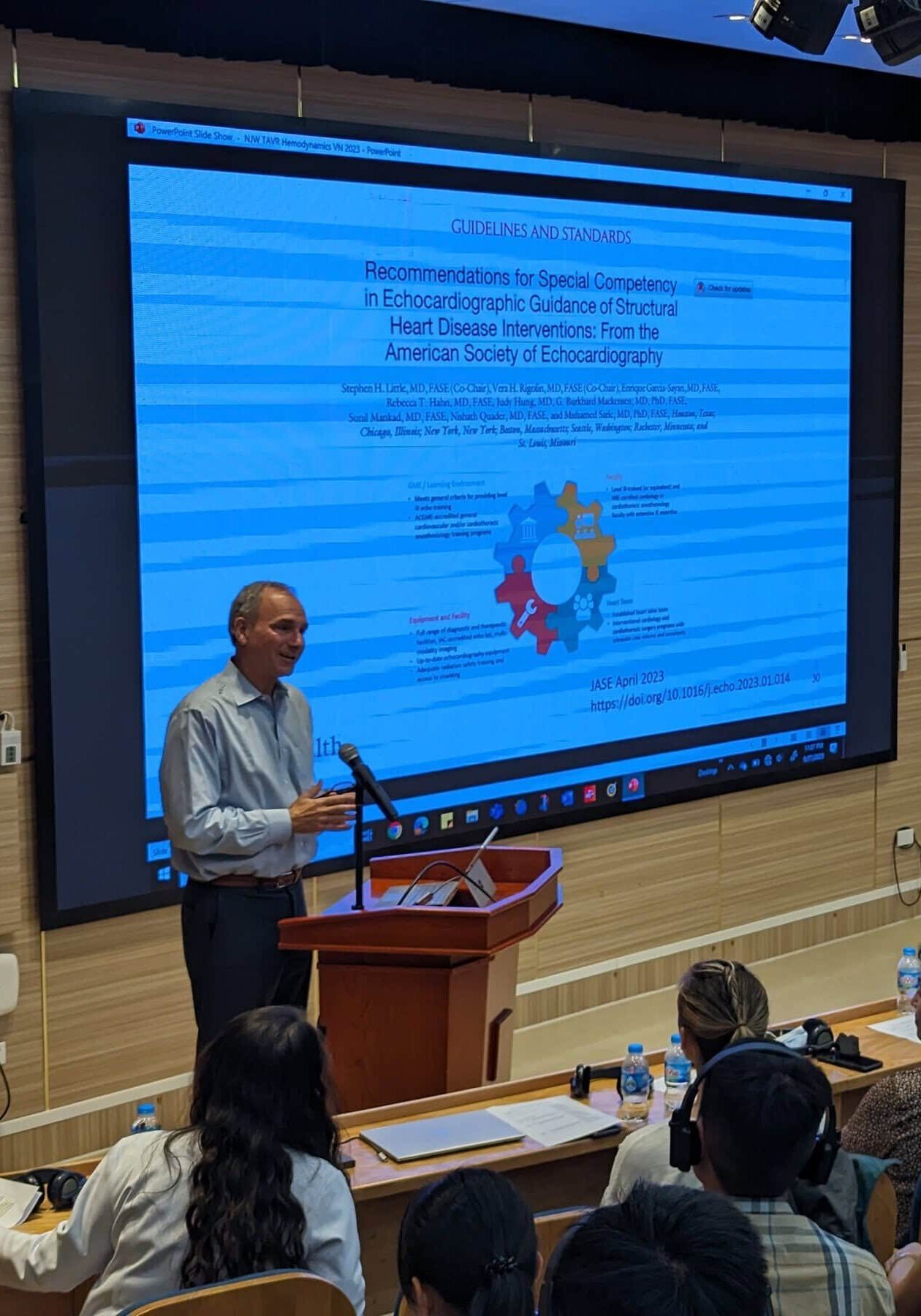 A man giving a lecture about his findings